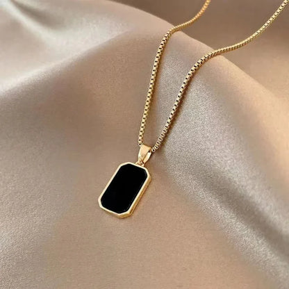 Reversible Gold Rectangle Pendant Necklace – Black Onyx & White Mother of Pearl