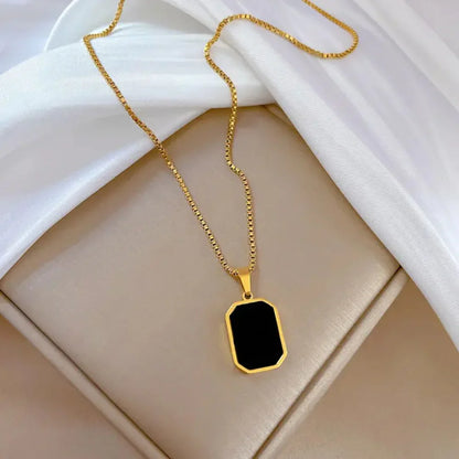 Reversible Gold Rectangle Pendant Necklace – Black Onyx & White Mother of Pearl