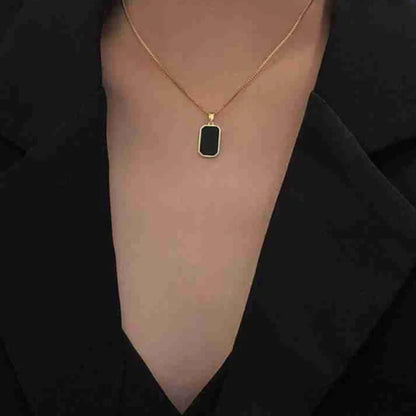 Reversible Gold Rectangle Pendant Necklace – Black Onyx & White Mother of Pearl